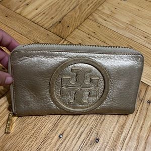 Gold Tory Burch zip wallet